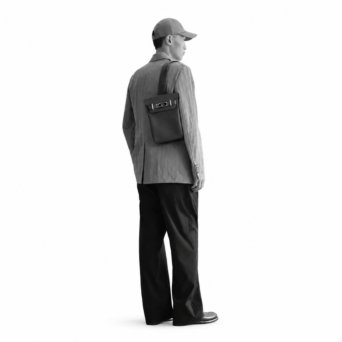 Hermès Hac a Dos PM – Ébène – On-body styling on white background