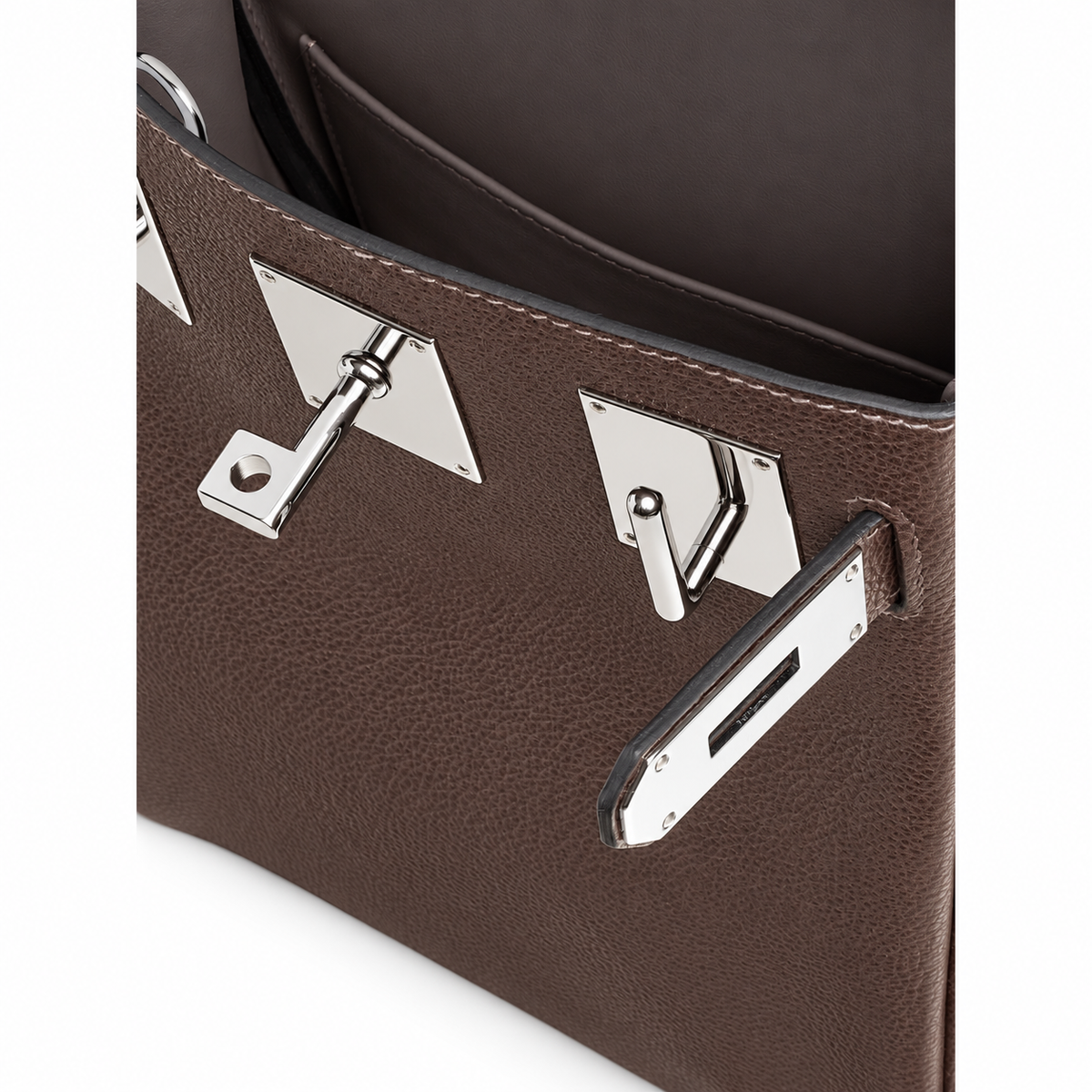 Hermès Hac a Dos PM – Ébène – Clasp close-up on white background