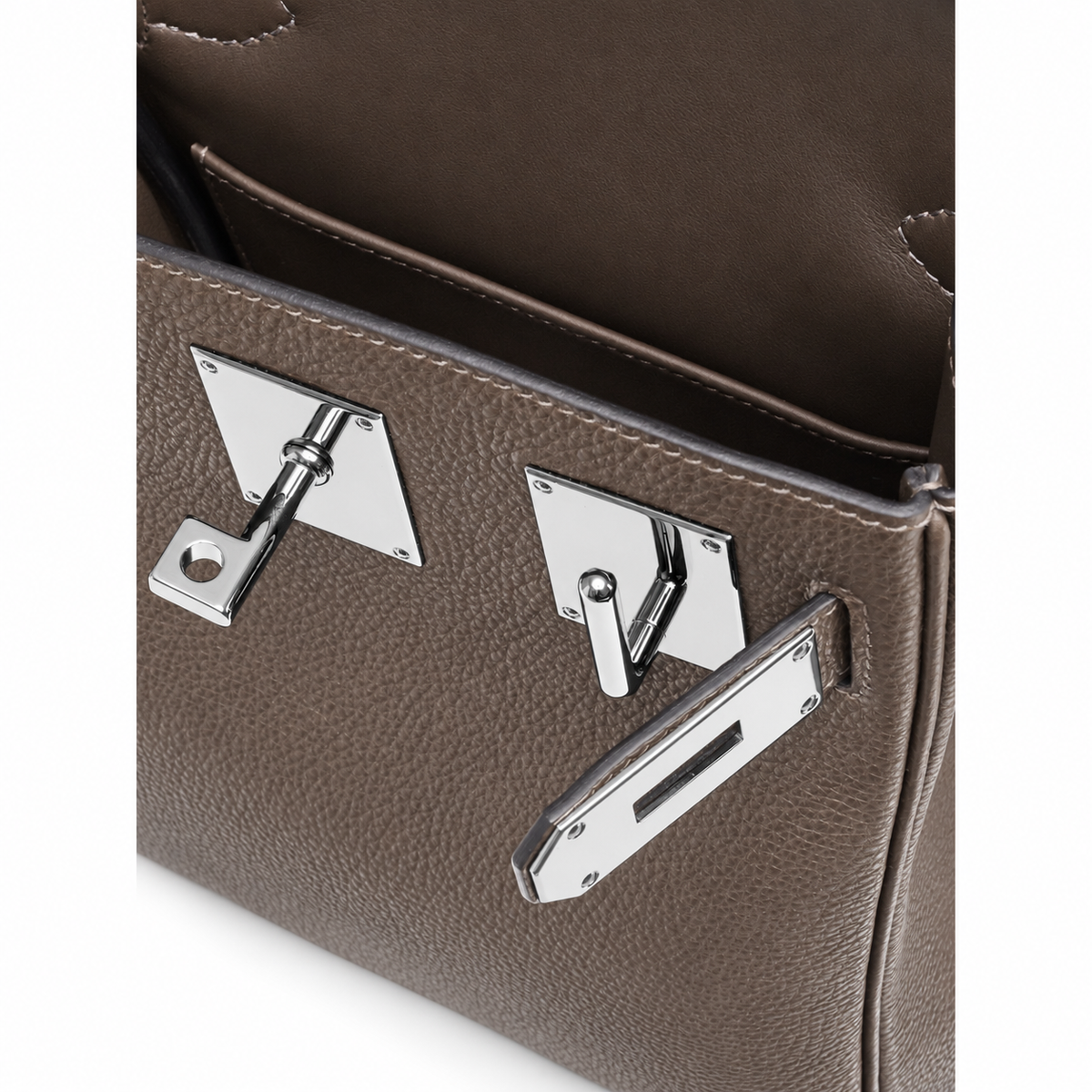 Hermès Hac a Dos PM – Gris Étain – Clasp close-up on white background